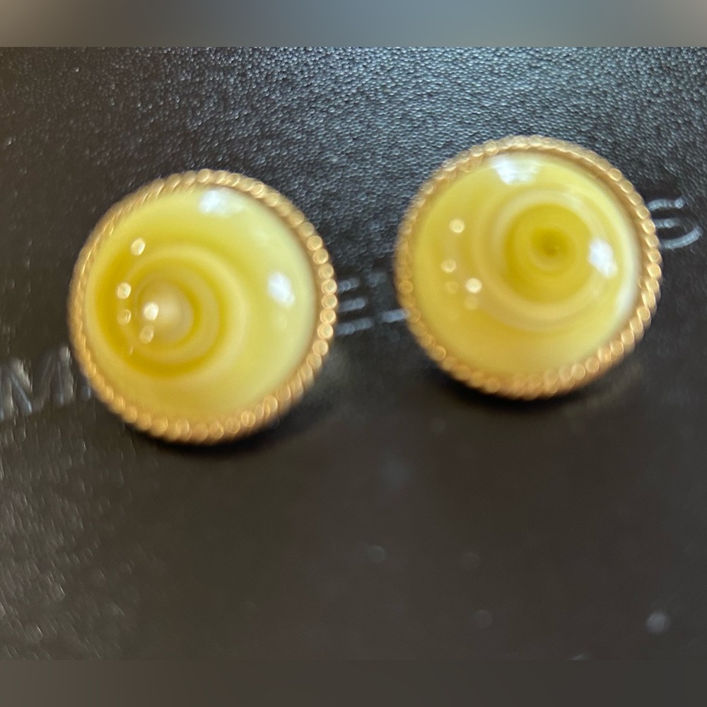 Yellow with gold trim clip on earrings